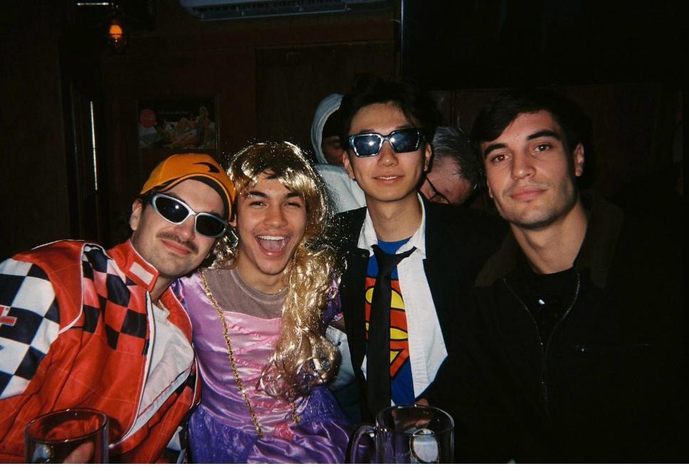 Friends in costume at a themed night