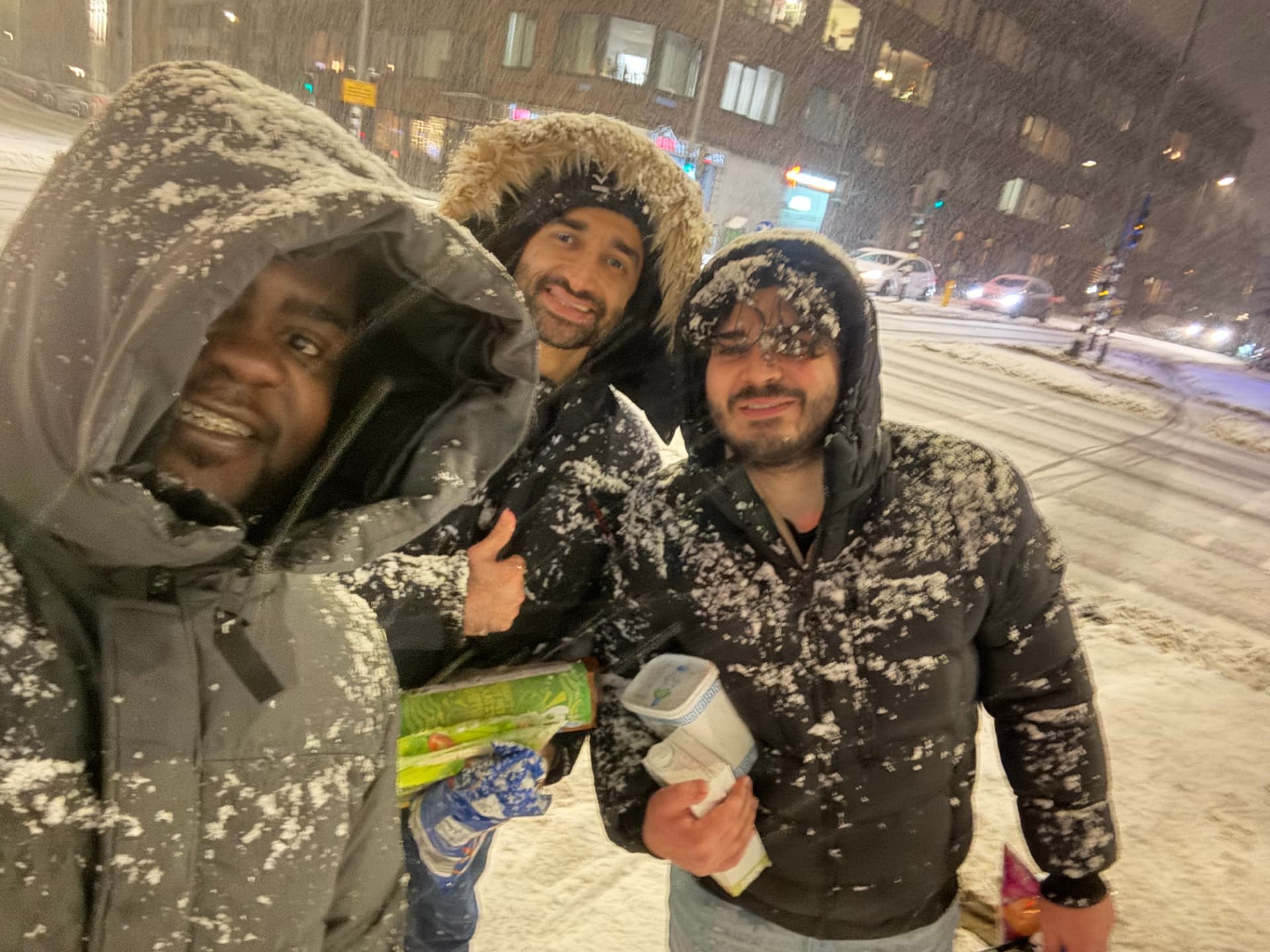 Friends caught in a snowstorm at night